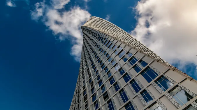 A modern skyscraper twisting towards the sky