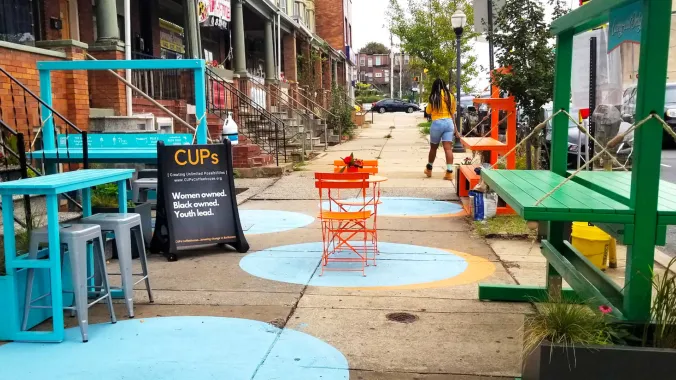painted sidewalk and seating area placemaking project