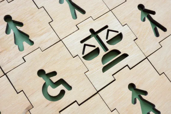 Image of International Symbol of Access next to weighing scales