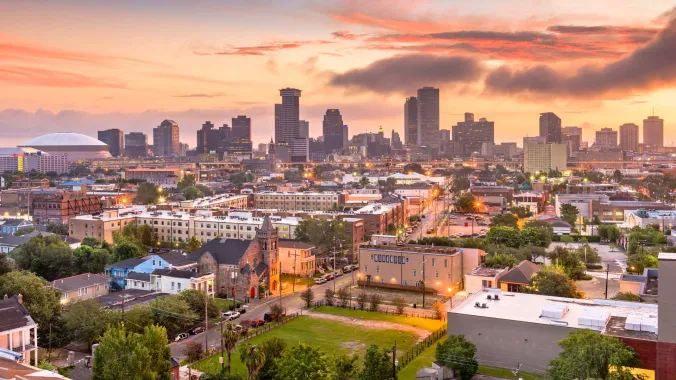 New Orleans neighborhood with city skyline in background