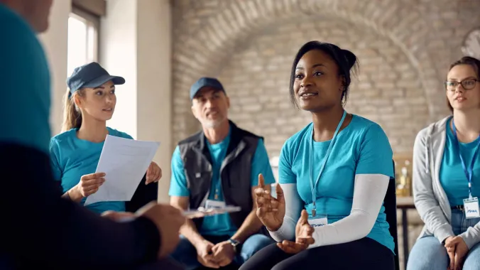 group of volunteers sitting and talking