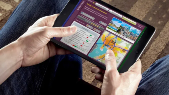 hands holding tablet 