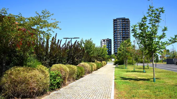 leed buildings with green space in foreground