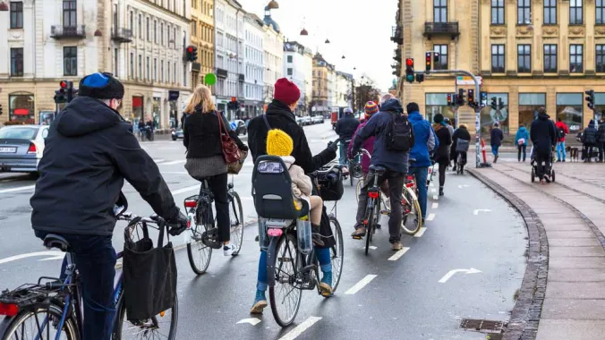 group of bicyclists in bike lane 