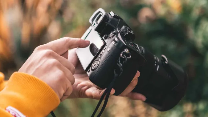 person holding video camera