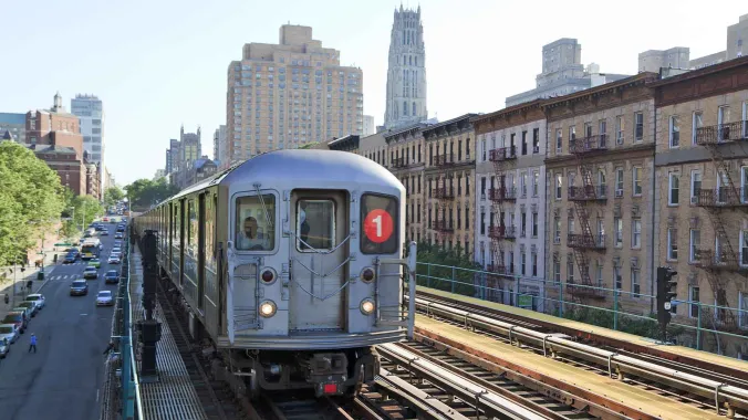 metro train with buildings in background