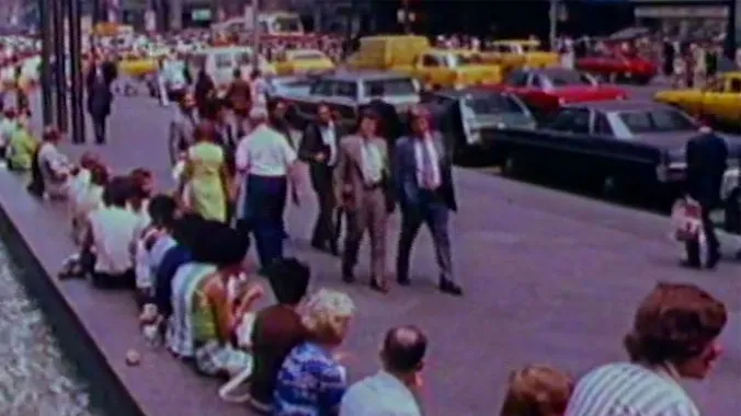 people sitting in outdoor plaza