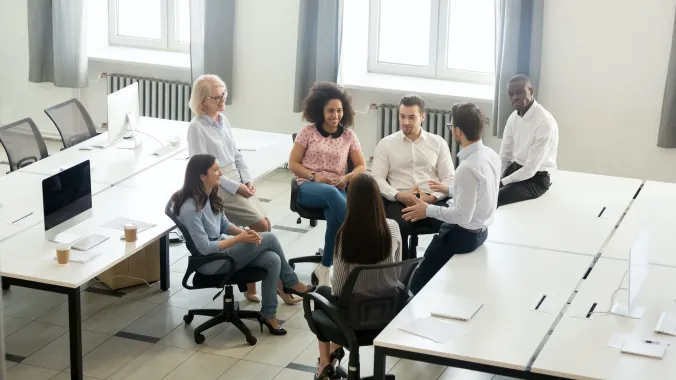Small group of people gathering for a meeting
