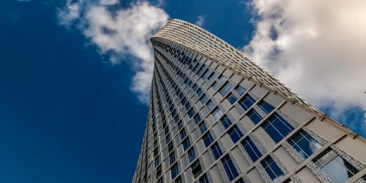 A modern skyscraper twisting towards the sky