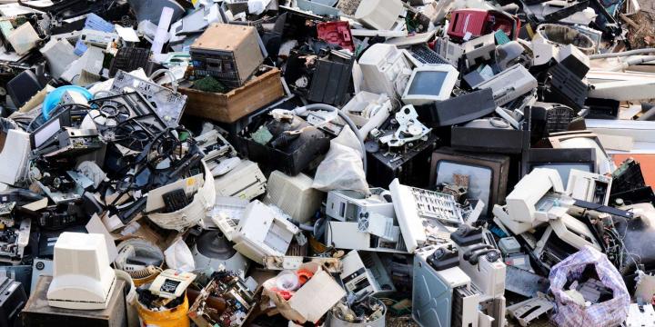 large landfill with electronics and computers 