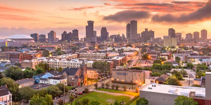 New Orleans neighborhood with city skyline in background