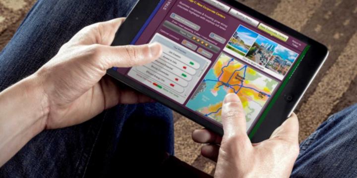 hands holding tablet 