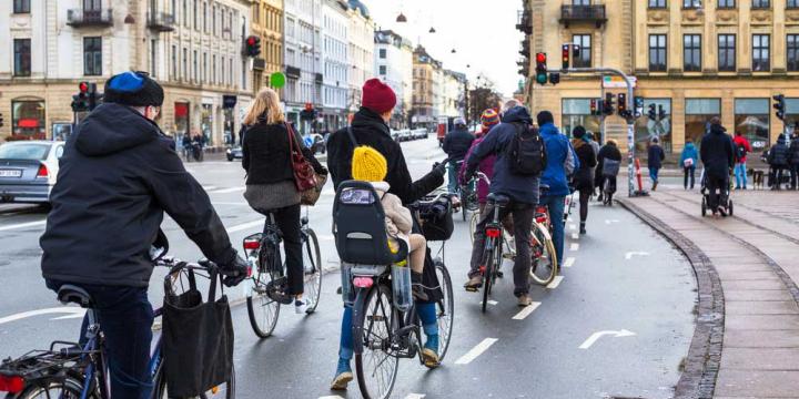 group of bicyclists in bike lane 