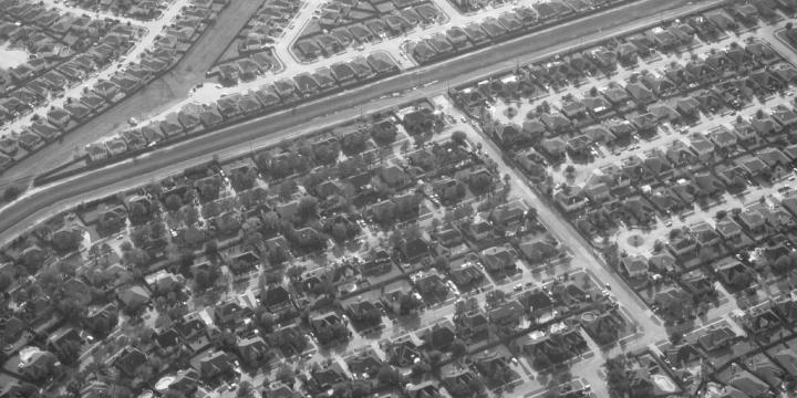 black and white image aerial of suburban homes