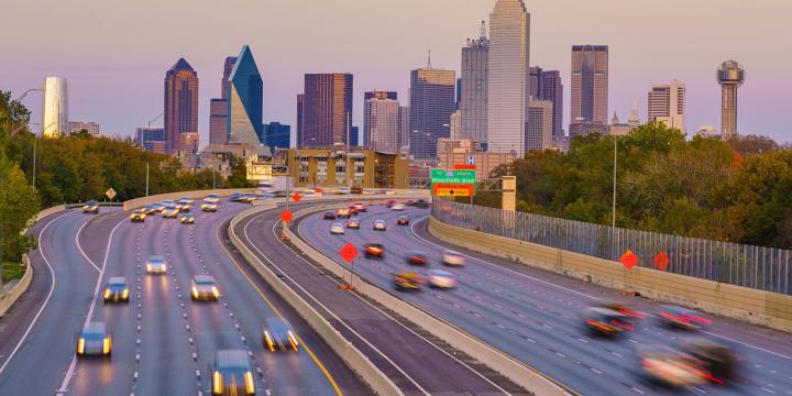 freeway with Dallas skyline in background