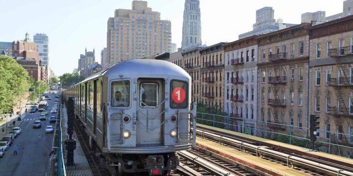 metro train with buildings in background