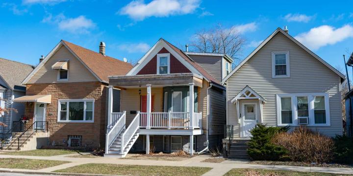 a row of three suburban homes