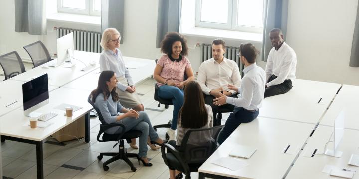 Small group of people gathering for a meeting